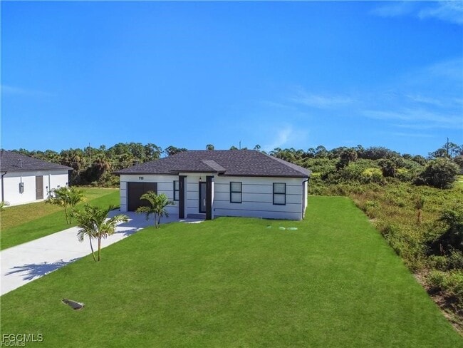 Building Photo - 713 Roma Ave S