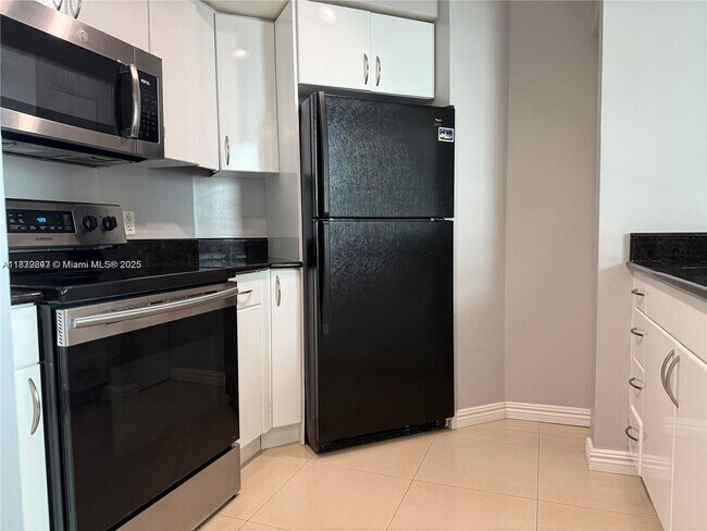 Building Photo - 9201 Collins Ave