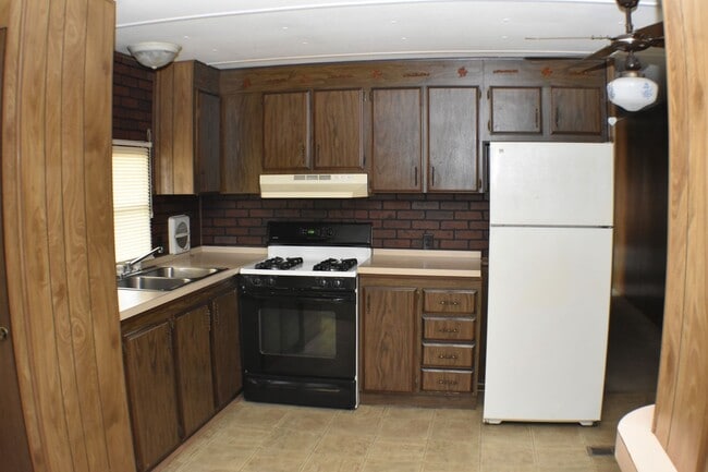 Building Photo - Charming Mobile Home with Utility Shed