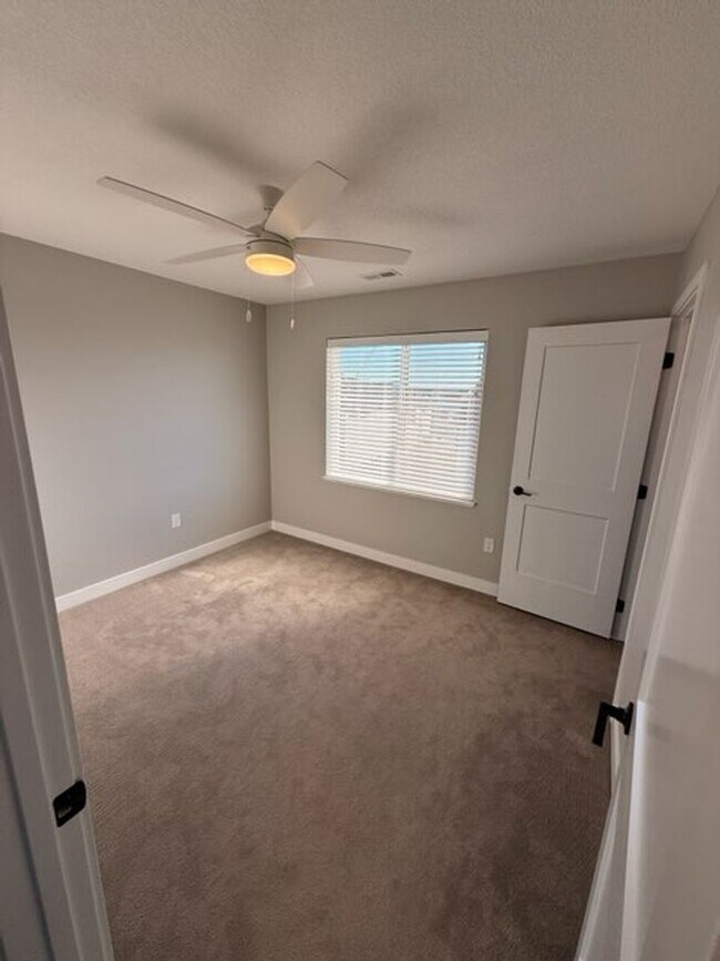 Building Photo - Spacious 4-Bedroom Home with 2-Car Garage & Yard