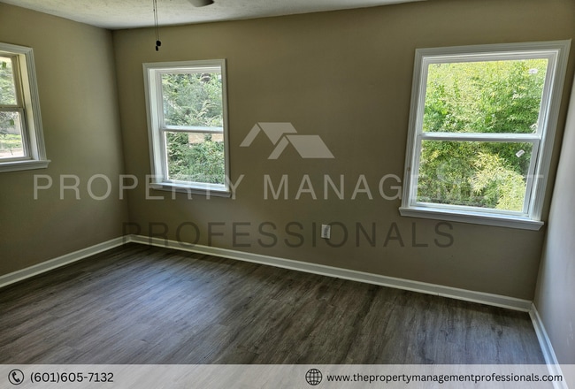 Building Photo - Plenty of space to roam and call home!