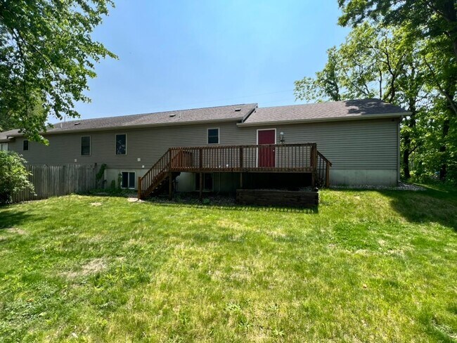 Building Photo - Spacious 3BR Duplex with Finished Basement & 2-Car Garage in Otsego