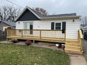 Building Photo - Beautifully updated with modern upgrades and cozy charm. PETS WELCOME