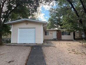 Building Photo - 4 bed 1.5 bath Ranch Style Home with Basem...
