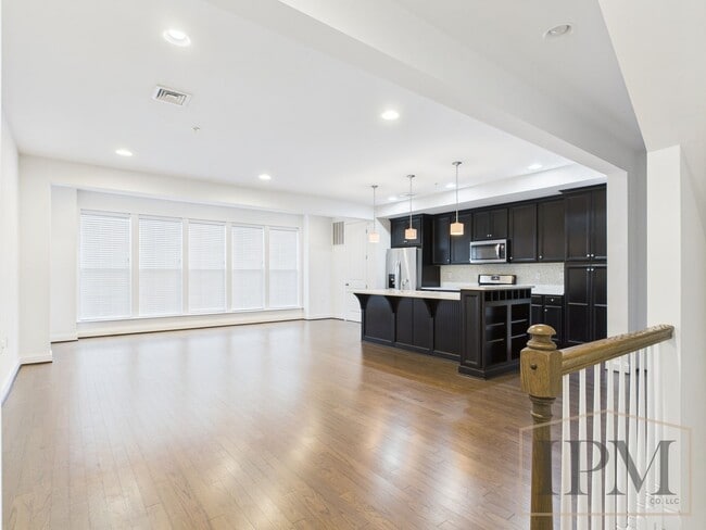 Building Photo - 2-bedroom 2.5 bath Luxury Townhome located...