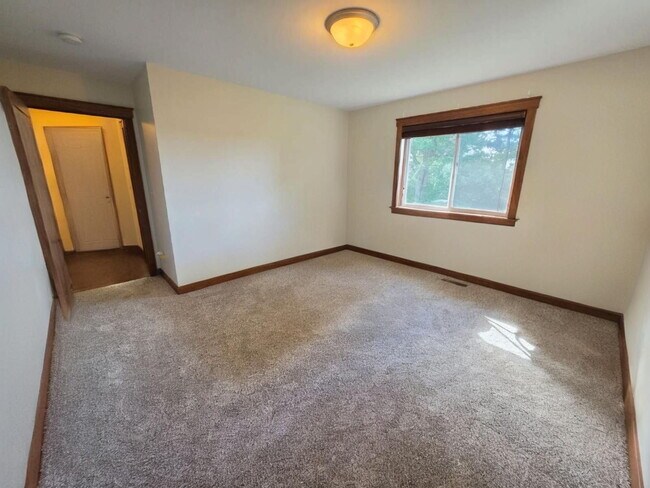 Building Photo - FREE SEPTEMBER RENT for this Spacious 4-Bedroom Home with Vaulted Ceilings with Finished Basement...