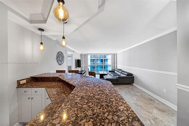 Building Photo - 6917 Collins Ave