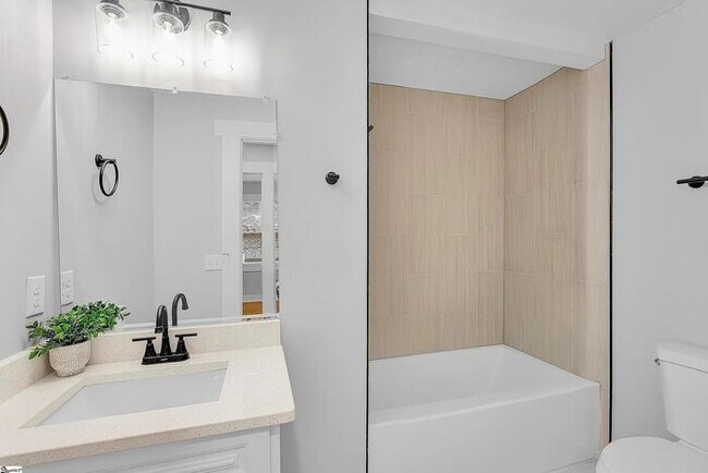 Building Photo - A 4-bedroom GEM!!