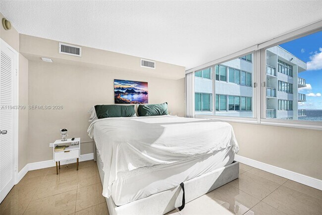 Building Photo - 7135 Collins Ave