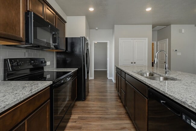 Building Photo - Live, love, and grow in this charming townhome!