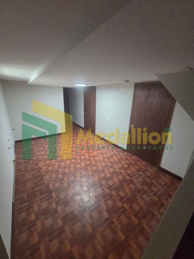 Building Photo - Spacious 6-Bedroom Home with Finished Basement and Backyard