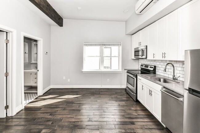 Building Photo - Boutique Condo in Truxton Circle!