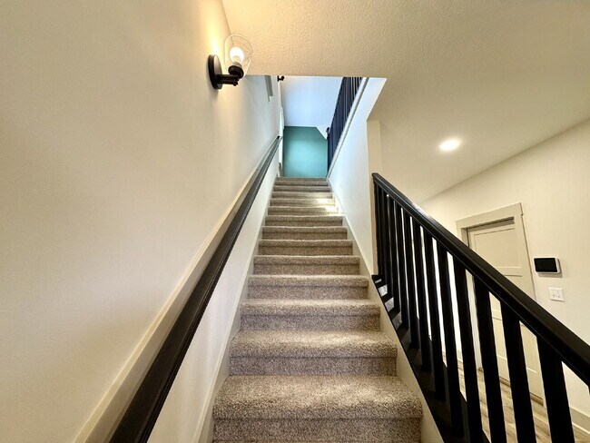 Building Photo - Need Space?  How about 5 bedrooms, 2.5 baths + an extra bonus area upstairs so that the kids can ...