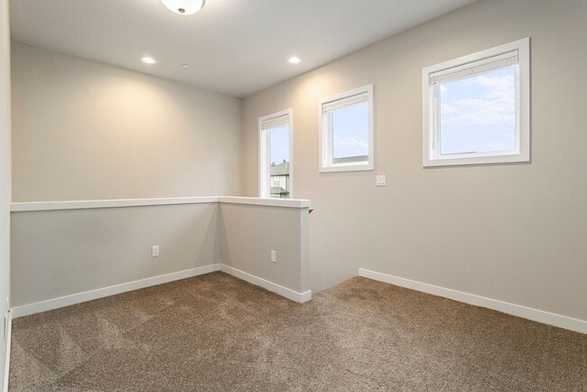 Building Photo - 2022 Build -Almost Brand New 3 br 2.5 bth Home with hardwoods, fenced yard and backs to greenspace !