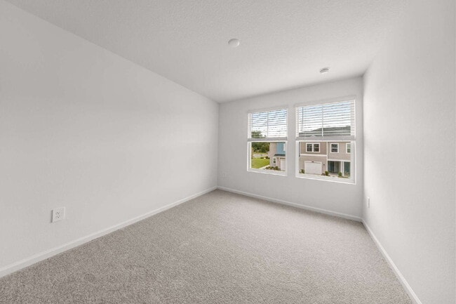 Building Photo - Be the First to Lease This 3BR Townhome in Marion Ranch | Loft + Garage + Screened Lanai + Includ...