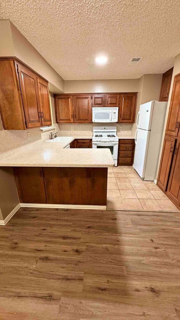 Building Photo - 3 bedroom / 2 bath / 2 car garage - Covered porch with shaded back yard