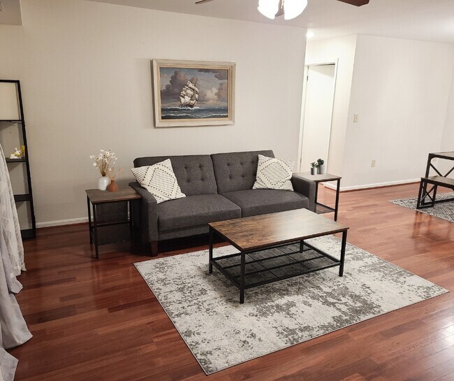 Have friends and family come to visit and stay on this comfy couch that turns into a full sized bed. - 12032 Cardamom Dr