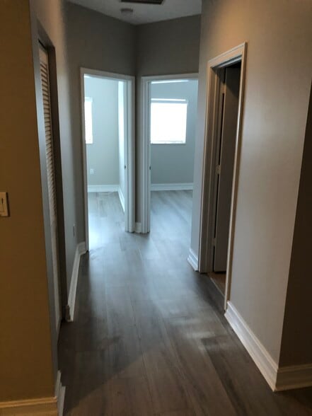 hallway to 2nd and 3rd bedr - 4412 Hidden Harbour Ter