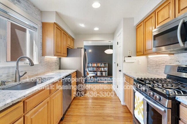 Building Photo - 10247 NW Village Heights Dr