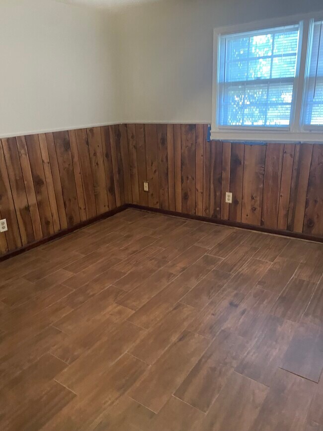 Master has new flooring - 106 Henry St