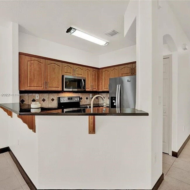 Building Photo - 10902 NW 79th St