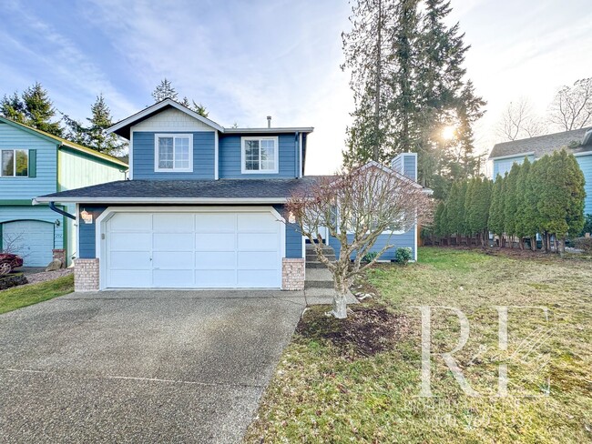 Building Photo - Sun-Kissed Serenity: Tri-Level Home Bathed...