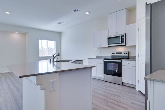 Building Photo - NW 3 Bedroom Townhouse!! Gated Community Pool!! 2 Car Garage!!! No Carpet downstairs.