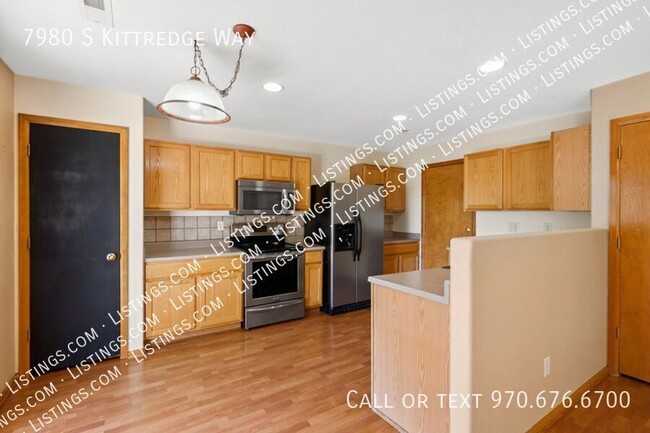 Building Photo - Spacious Townhome - Backs to Open Space!