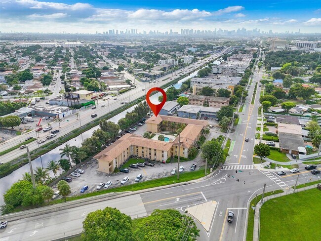 Building Photo - 241 S Royal Poinciana Blvd