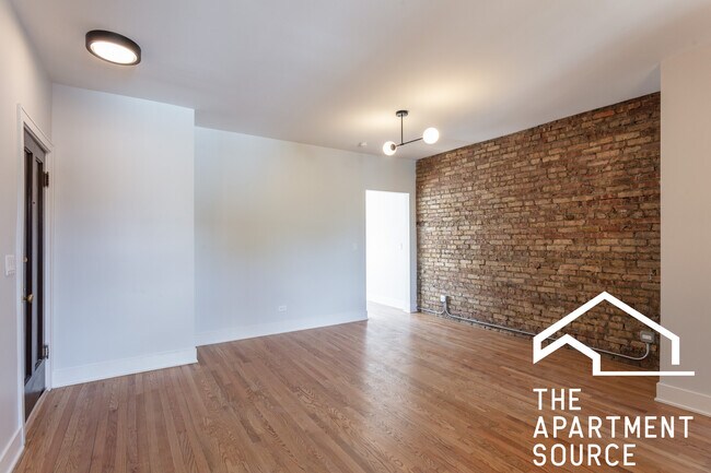 Building Photo - 4011a North Lowell Ave. Unit 3