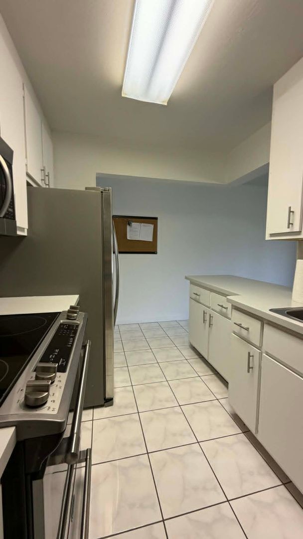Building Photo - FIRST MONTHS RENT FREE!!! Beautiful 2 MASTER SUITE CONDO in Central Ft. Myers with Over 1200 Sqft.