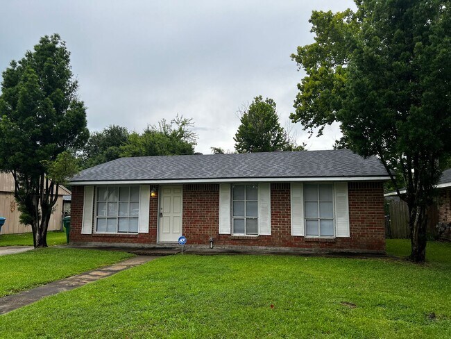 Building Photo - 3 Bedroom, 1.5 Bathroom, Brick Home with yard and Storage Building, Covered Porch