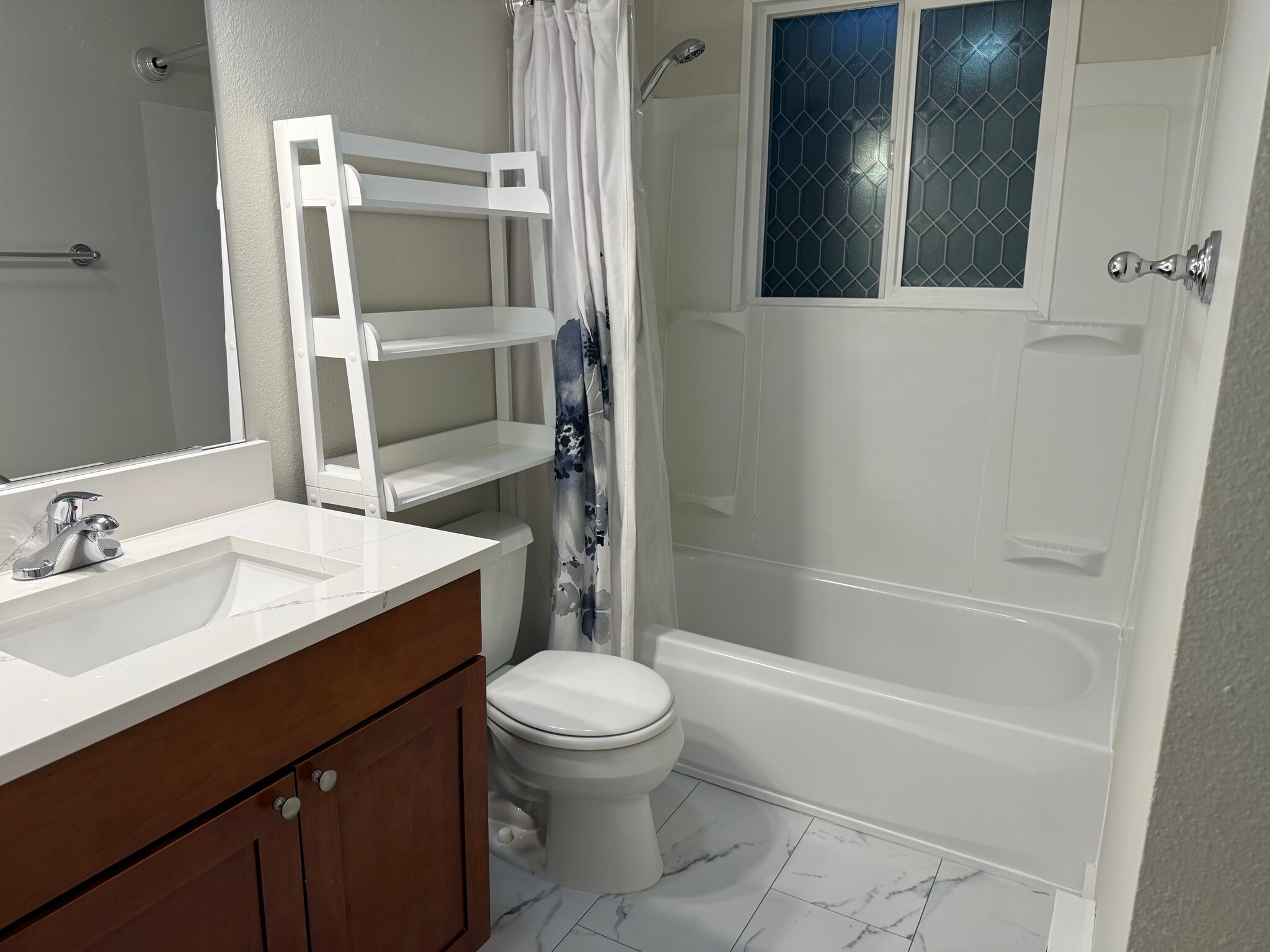 Newly refinished tub + newly installed vinyl floors - 1520 NE 195th St