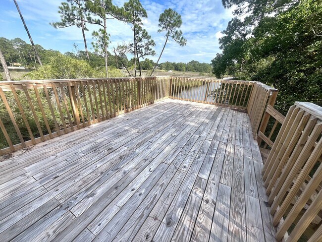 Building Photo - Waterfront Escape with Sunrise Views and S...