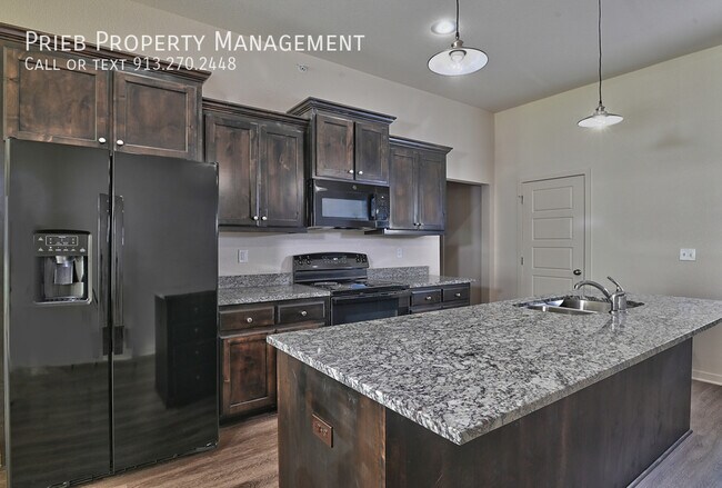 Building Photo - Reserve Townhome - Available May 15th