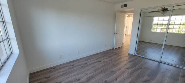 2nd bedroom view of floor and closet - 14126 Tiara St