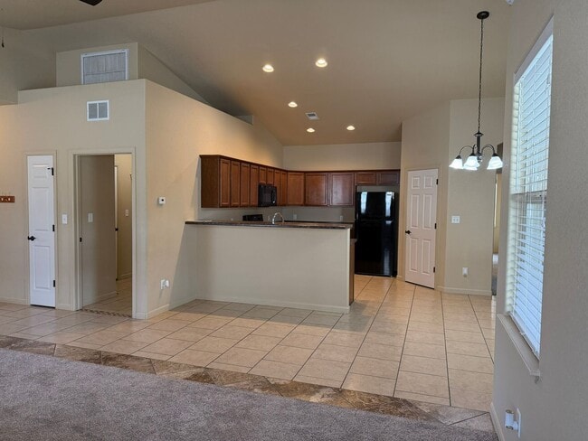 Building Photo - Beautiful 4 bedroom, 2 bath, 3 car garage ...