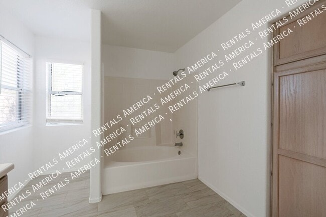 Building Photo - 5573 W Dove of Peace Dr