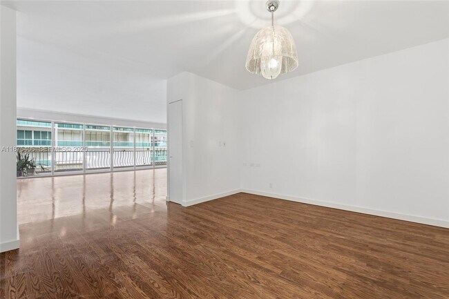 Building Photo - 10155 Collins Ave