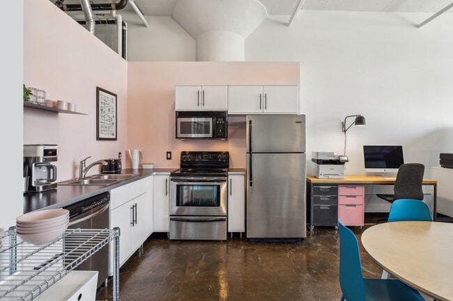 Kitchen features modern stainless steel appliances. - 500 Robert St N