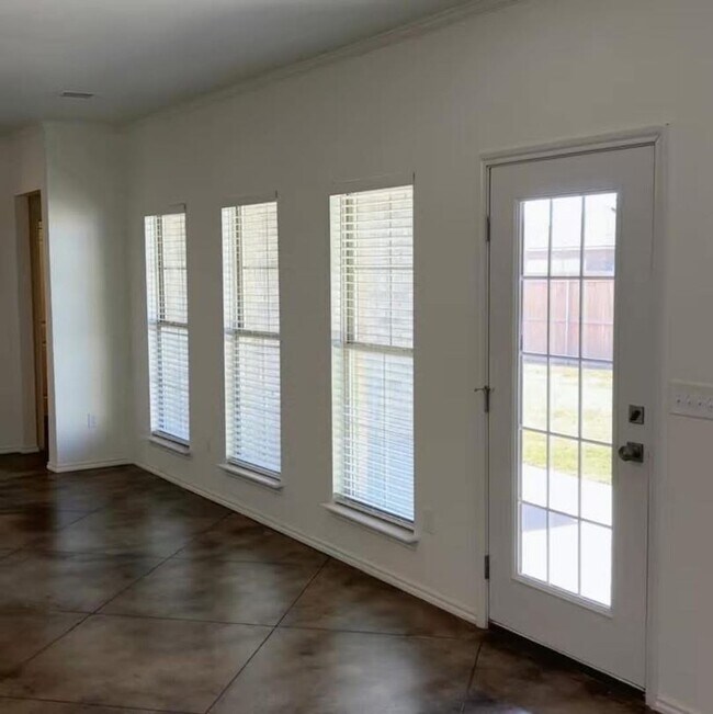 Building Photo - Stunning New 3/2 Townhomes