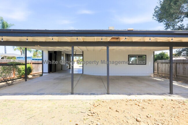 Building Photo - Rare Gated Orange Park Acres 3 Bedroom Property Featuring a Commercial Workshop & Studio