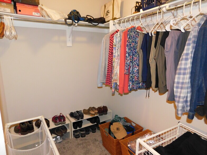 Walk in closet in primary suite - 4656 W Fairbanks Way