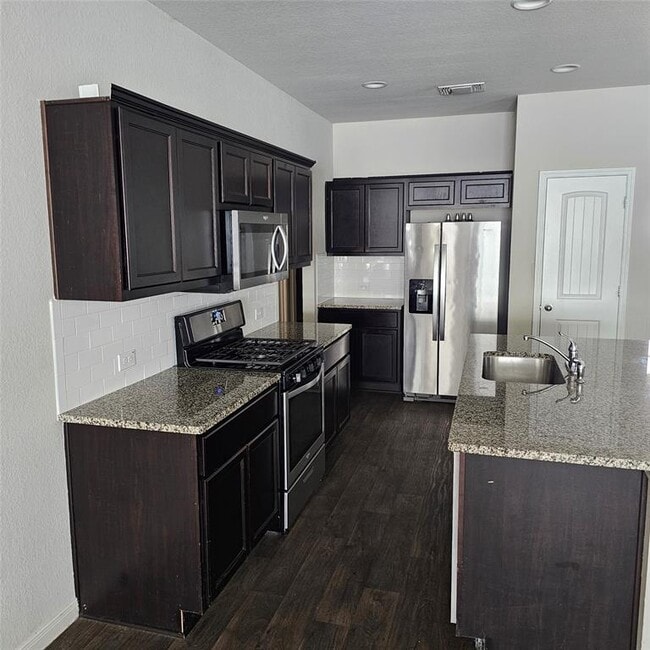 Building Photo - 14010 Macquarie Dr