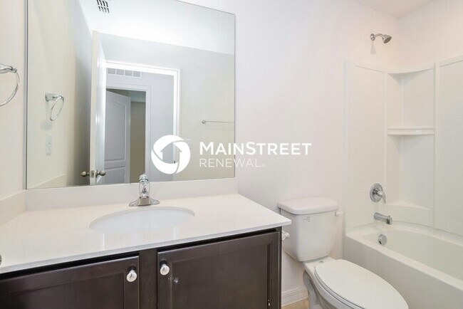 Building Photo - 4 Bedroom Pet-Friendly Home in Mascotte, FL with Main Street Renewal