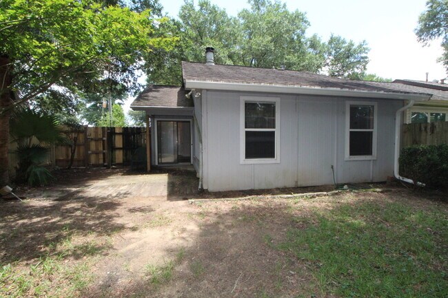 Building Photo - 2BR Home with Wood-Look Flooring, Fenced Backyard & Private Patio