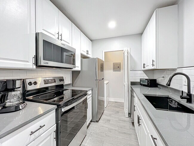 Building Photo - South Kirkman Road, Orlando, FL 32811 - 2 BR 2 BA condo