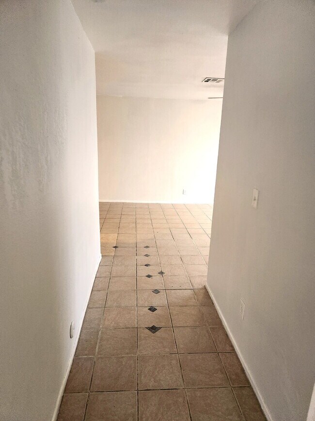 Building Photo - FIRST FLOOR LIVING WITH OPEN KITCHEN, DEN & CARPORT – GCU ACCESS