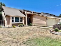 Building Photo - NOW AVAILABLE - 4 BED, 3 BATH, 2 CAR GARAG...