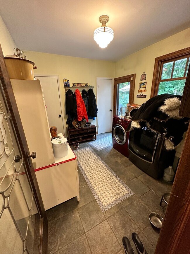 Building Photo - Dream Home in Highland, Michigan: Your Private Oasis on 5 Wooded Acres